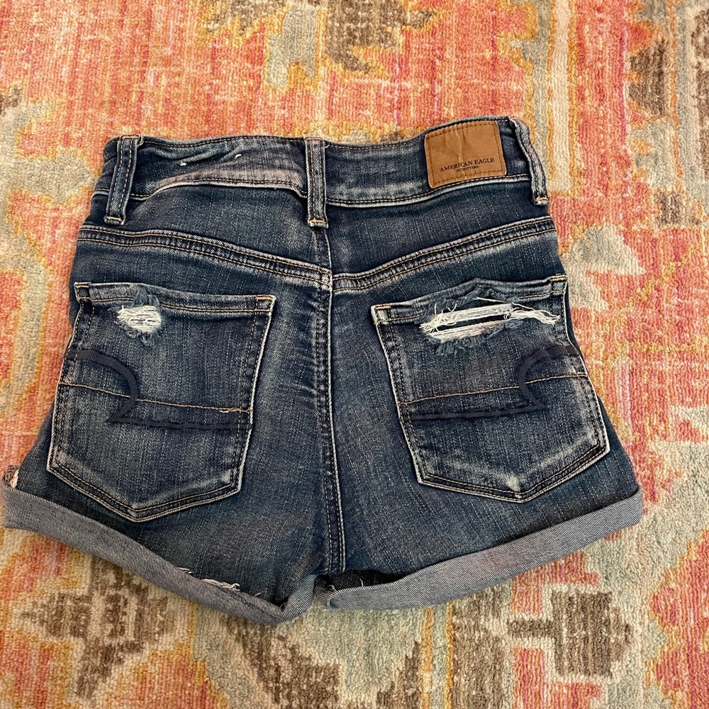 Distressed American Eagle high rise shorts “next level stretch”